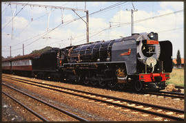 April 1990. SAR Class 25NC No 3476 'Griet' with passenger train.
