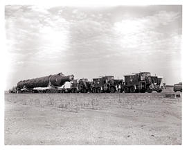 Richards Bay district, 1978. Abnormal load on SAR trailer No MT23019 hauled by three Internationa...