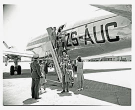 Cape Town, 1947. SAA Douglas DC-4 ZS-AUC 'Drakensberg' passengers on stairs.