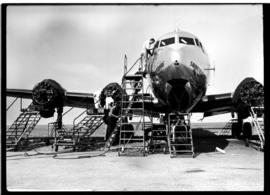 Johannesburg, circa 1949. Rand Airport. SAA Douglas DC-4 ZS-BWN 'Swartberg' being worked on on ap...