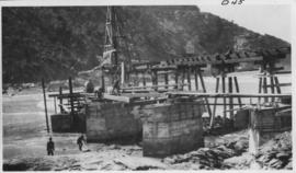 Wilderness, circa 1926. Kaaimans River bridge construction: The first three piers are built on op...