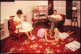 Family relaxing in SAR staff housing.