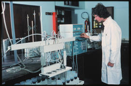 Chemist at work in laboratory.