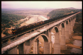 Natal. Coal train on concrete arch bridge.