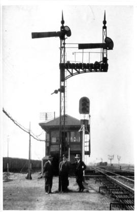 Cape Town, 27 August 1932. Maitland down main starter signals. Left to right: J Pethick, W Webb a...