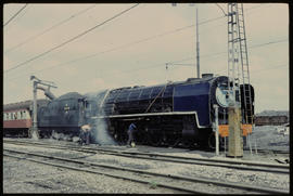 Theunissen district, February 1976. SAR Class 23 No 3246 taking water at Vetrivier station.