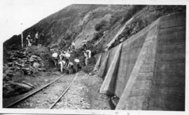 Clearing away rubble after embankment failure. SAME SPOT AS P3030_18 (Lund collection)
