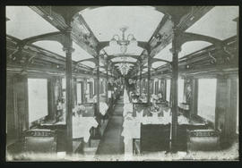 Interior of SAR type A-22 dining car showing frameless windows.