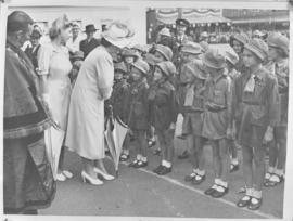 Queen Elizabeth and Princess Elizabeth speaking to young girl scouts.