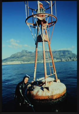 Cape Town, 1987 SAR diver at ocean buoy.