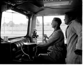 January 1966. Driver and assistant in cabin of SAR Class ? No E750.