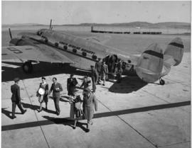 Passengers leaving SAA Lockheed Lodestar ZS-ATI 'General JW Janssens'. Note Lockheed logo on the ...