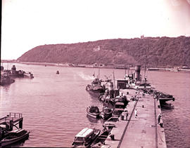 Durban, 1948. Harbour tug 'Harry Escombe' at entrance to Durban Harbour.