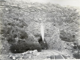 De Doorns district. CGR locomotive leaving tunnel in the Hex River mountains.