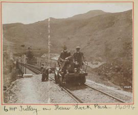 Bot River district. Two men on 6 hp trolley on Houwhoek Pass.