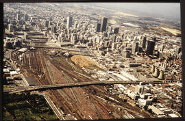 Johannesburg. Aerial view of railway marshalling yard en city centre.