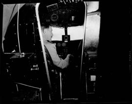 Circa 1946. SAA pilot in cockpit of SAA Lockheed Lodestar ZS-ATE.