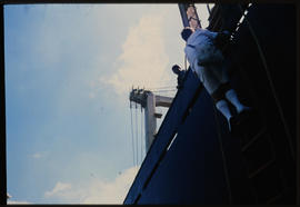 Richards Bay. Climbing onto ship with ladder.