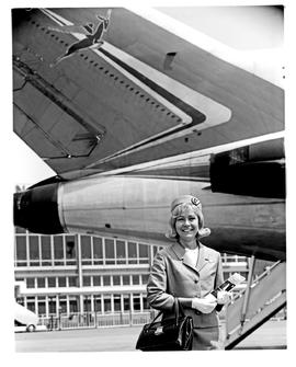 Johannesburg, 1968. Jan Smuts airport. SAA Boeing 727 ZS-DYO 'Vaal'. Hostess standing next to tail.