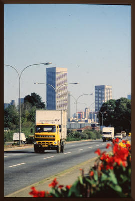 Johannesburg, 1989. Leyland truck with Fastfreight container on city street. [Z Crafford]