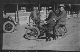 Circa 1925. Three men with motorcycle. (Album on Natal electrification)