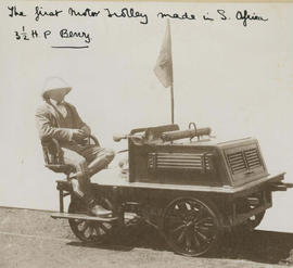 Frank Dutton on a 3.5 hp Benz trolley, the first motor trolley to be built in South Africa.