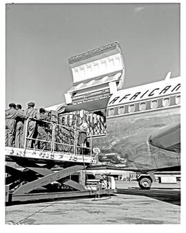 Johannesburg, 1969. Jan Smuts airport. SAA Boeing 727 ZS-EKX 'Swakop'. Cargo door open for cargo ...