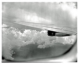 
SAA Boeing 707 ZS-CKC 'Johannesburg'. Shot of wing and engine while flying In clouds.
