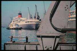 Durban, November 1974. SAR tug 'Jan Haywood' with 'Windsor Castle' in Durban Harbour. [S Mathyssen]