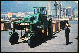 Cape Town, January 1968. SAR straddle carrier in Table Bay Harbour. [King / HT Hutton]