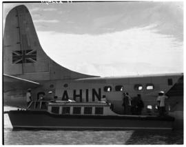 Vaal Dam, May 1948. Arrival of BOAC Solent flying boat G-AHIN 'Southampton'. Passengers being tra...