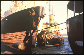 Durban, 1974. Tug 'Sir William Hoy' assiting 'Factor' in Durban Harbour.