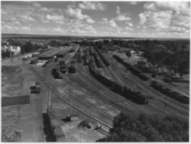 Kroonstad, 1940. Railway yard with several trains shunting.