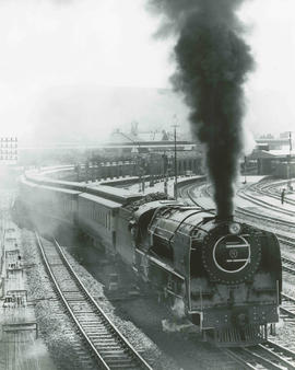 Bloemfontein, 1957. SAR Class 16E departing heading the 'Orange Express'.