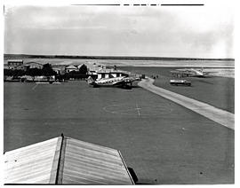Kimberley, 1948. SAA Lockheed Lodestar ZS-ATB 'President Brand' in front of buildings. SAA Vicker...
