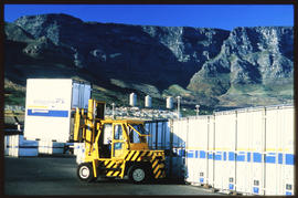 Cape Town, 1988. Forklift loading Fastfreight containers at Culemborg depot.