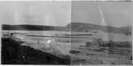Oudtshoorn district, June 1924. Kammanassie dam overflowing for the first time.