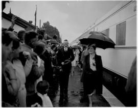 Sterkstroom, 6 March 1947. Queen Elizabeth smiling at the crowd on the station platform from unde...