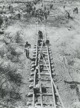 Upington district, 1914/15. Platelaying for the Prieska-Kalkfontein line, viewed from the illumin...