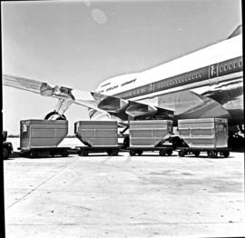 
SAA Boeing 747 ZS-SAN 'Lebombo' with luggage loading trailers.
