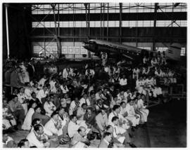 August 1960. Retirement Mr Bailey, Engineering in hangar with Douglas DC-3 ZS-DJC 'Mount Prospect'.