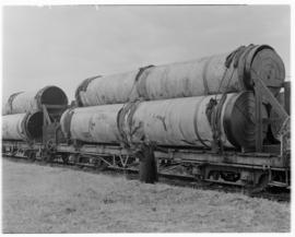 Vereeniging, May 1946. Inspection of SAR type D-13 wagon No 8840 loaded with large pipes.