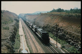 
SAR ore train in cutting, headed by six diesel locomotives.
