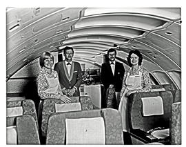 
Hostesses and stewards in SAA Boeing 747SP interior.
