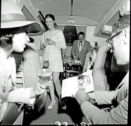 
SAA Boeing 707 interior. Cabin service. Steward.
