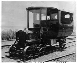 Motorcar converted to CSAR railcar C207, white steam car with new body.