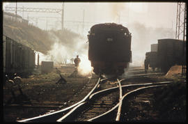 Johannesburg, September 1975. Steam locomotive changing tracks at Park Station. [EG Butcher]