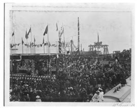 Durban, 15 August 1901. Decorated harbour with crowd and guard of honour for the arrival of the D...