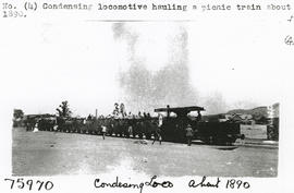 Circa 1890. Condensing locomotive hauling a picnic train.