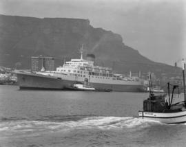 Cape Town, 1966. Cape Town, 1966. Tug with 'Windsor Castle' in Table Bay Harbour. Second tug with...
